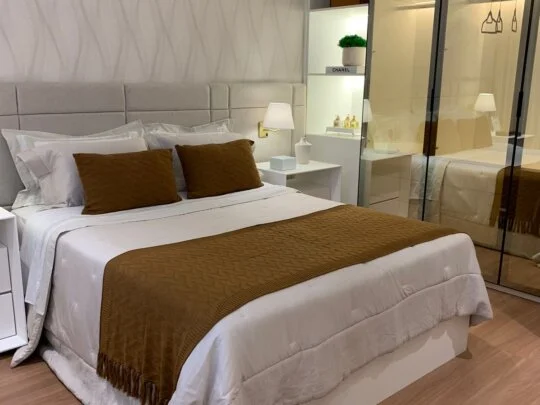 Suíte do apartamento três quartos